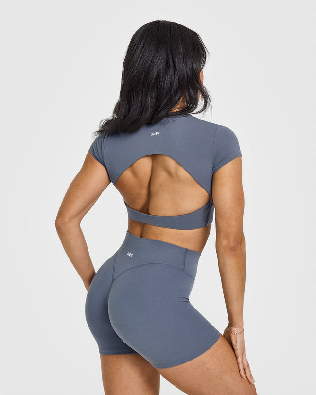 SoftMotionâ„¢ Short Sleeve Crop Top with White Logo | Granite Blue