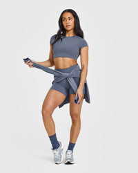 SoftMotionâ„¢ Short Sleeve Crop Top with White Logo | Granite Blue