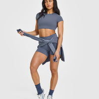 SoftMotionâ„¢ Short Sleeve Crop Top with White Logo | Granite Blue