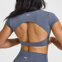 SoftMotionâ„¢ Short Sleeve Crop Top with White Logo | Granite Blue