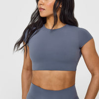 SoftMotionâ„¢ Short Sleeve Crop Top with White Logo | Granite Blue