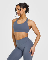 SoftMotion™ Sports Bra with White Logo | Granite Blue