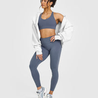 SoftMotion™ Sports Bra with White Logo | Granite Blue