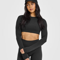 SoftMotionâ„¢ Long Sleeve Crop Top with White Logo | Soft Black
