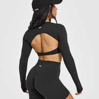 SoftMotionâ„¢ Long Sleeve Crop Top with White Logo | Soft Black