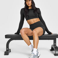 SoftMotionâ„¢ Long Sleeve Crop Top with White Logo | Soft Black