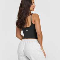 SoftMotion™ Strappy Mid Vest with Built in Bra Shelf with White Logo | Soft Black