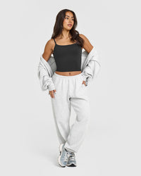 SoftMotion™ Strappy Mid Vest with Built in Bra Shelf with White Logo | Soft Black