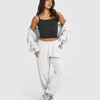SoftMotion™ Strappy Mid Vest with Built in Bra Shelf with White Logo | Soft Black