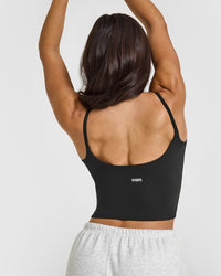 SoftMotion™ Strappy Mid Vest with Built in Bra Shelf with White Logo | Soft Black