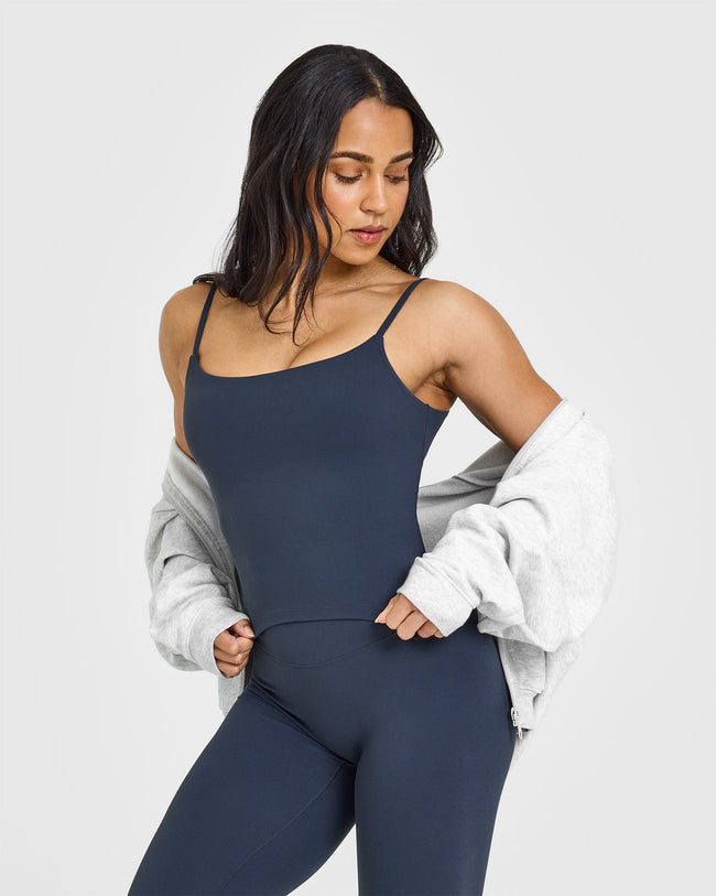 SoftMotionâ„¢ Strappy Mid Vest with Built in Bra Shelf with White Logo | True Blue