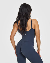 SoftMotionâ„¢ Strappy Mid Vest with Built in Bra Shelf with White Logo | True Blue