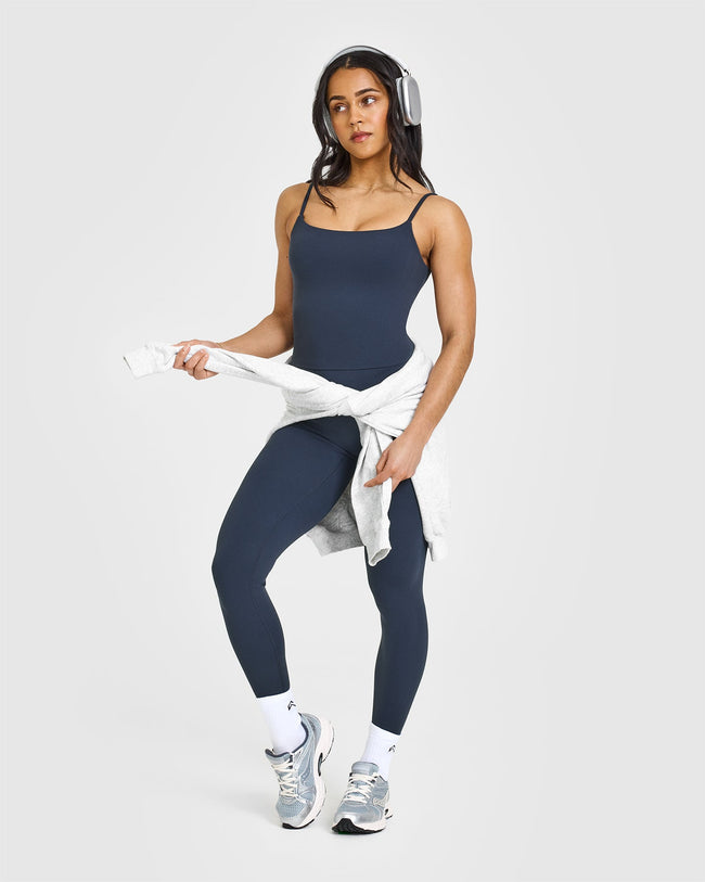 SoftMotionâ„¢ Strappy Mid Vest with Built in Bra Shelf with White Logo | True Blue
