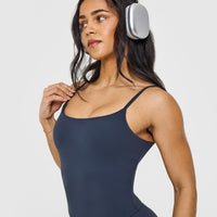 SoftMotionâ„¢ Strappy Mid Vest with Built in Bra Shelf with White Logo | True Blue
