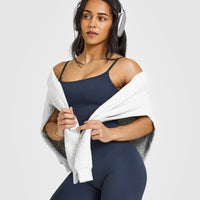 SoftMotionâ„¢ Strappy Mid Vest with Built in Bra Shelf with White Logo | True Blue
