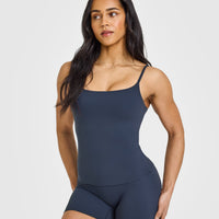 SoftMotionâ„¢ Strappy Vest with Built in Bra Shelf with White Logo | True Blue