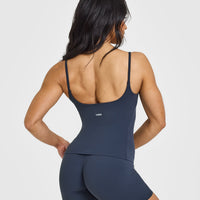 SoftMotionâ„¢ Strappy Vest with Built in Bra Shelf with White Logo | True Blue