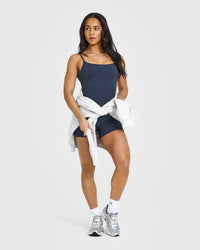 SoftMotionâ„¢ Strappy Vest with Built in Bra Shelf with White Logo | True Blue