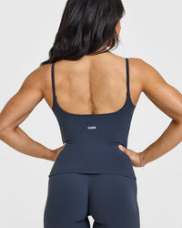 SoftMotionâ„¢ Strappy Vest with Built in Bra Shelf with White Logo | True Blue