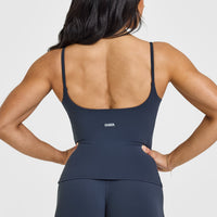SoftMotionâ„¢ Strappy Vest with Built in Bra Shelf with White Logo | True Blue