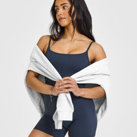 SoftMotionâ„¢ Strappy Vest with Built in Bra Shelf with White Logo | True Blue