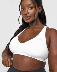 Effortless Seamless Racer Back Sports Bra with White Logo | White