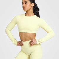 SoftMotionâ„¢ Long Sleeve Crop Top with White Logo | Pastel Yellow