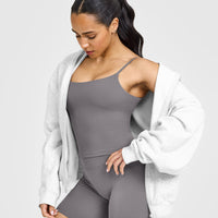 SoftMotionâ„¢ Strappy Mid Vest with Built in Bra Shelf with White Logo | Ash Grey