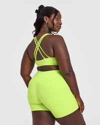 EasyLiftâ„¢ High Neck Sports Bra with White Logo | Citrus Green