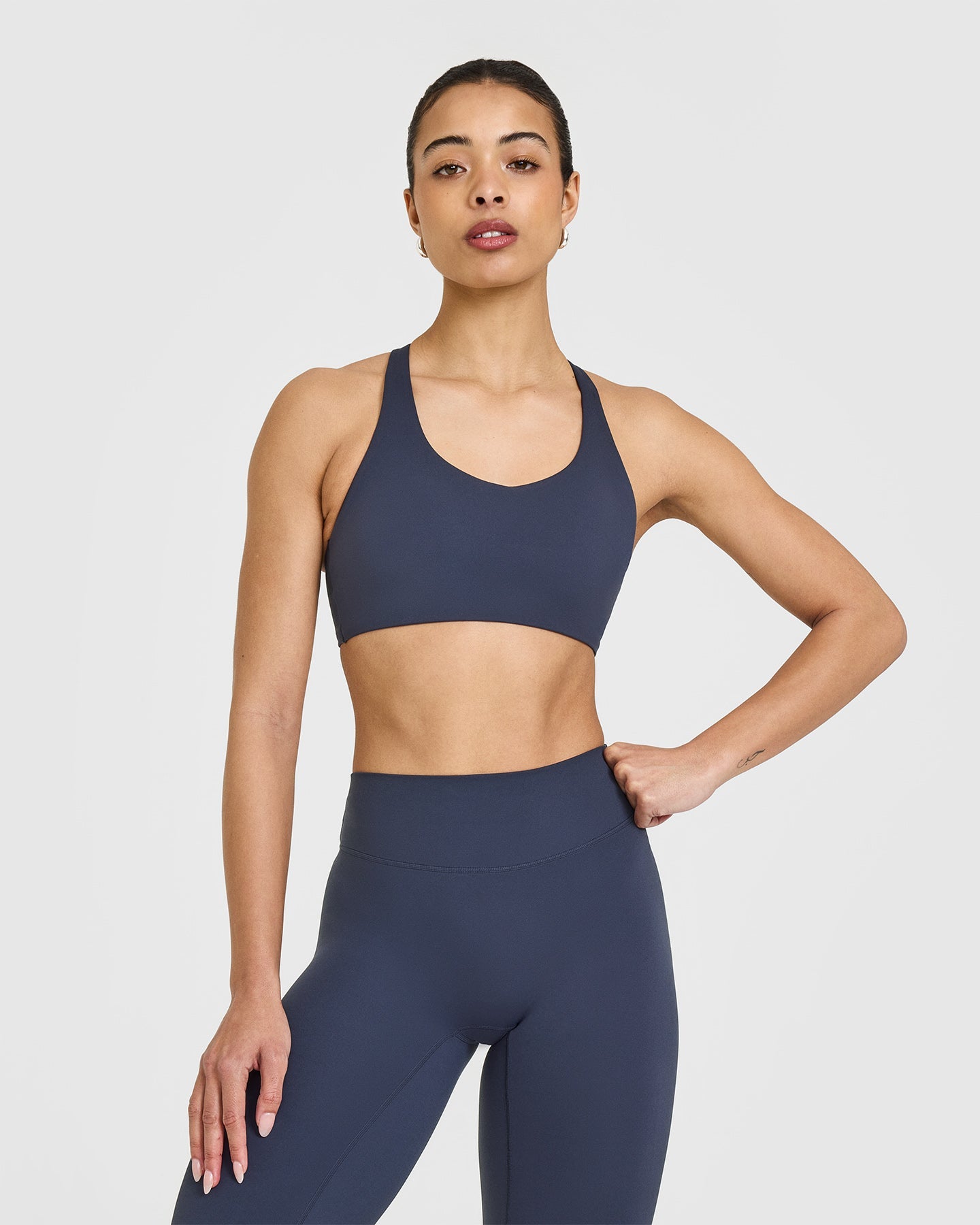 SoftMotionâ„¢ Sports Bra with White Logo | True Blue