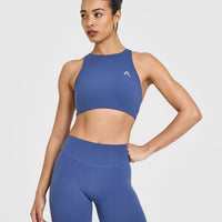 EasyLiftâ„¢ High Neck Sports Bra with White Logo | Shadow Blue