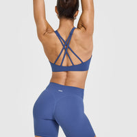 EasyLiftâ„¢ High Neck Sports Bra with White Logo | Shadow Blue