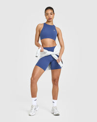 EasyLiftâ„¢ High Neck Sports Bra with White Logo | Shadow Blue