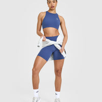 EasyLiftâ„¢ High Neck Sports Bra with White Logo | Shadow Blue