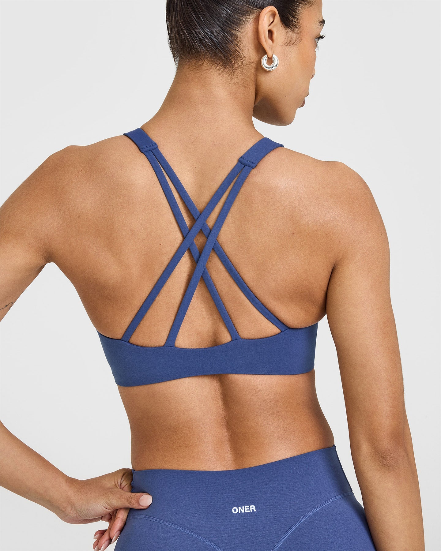 EasyLiftâ„¢ High Neck Sports Bra with White Logo | Shadow Blue
