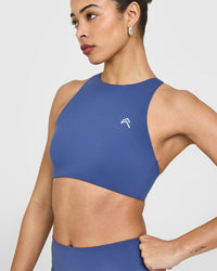 EasyLiftâ„¢ High Neck Sports Bra with White Logo | Shadow Blue