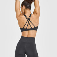 EasyLiftâ„¢ High Neck Sports Bra with White Logo | Coal
