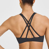 EasyLiftâ„¢ High Neck Sports Bra with White Logo | Coal