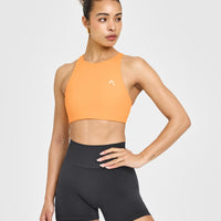 EasyLiftâ„¢ High Neck Sports Bra with White Logo | Powdered Orange