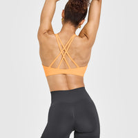 EasyLiftâ„¢ High Neck Sports Bra with White Logo | Powdered Orange