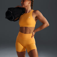 EasyLiftâ„¢ High Neck Sports Bra with White Logo | Powdered Orange
