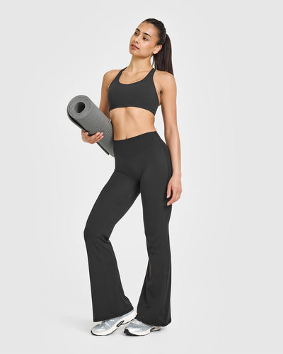 SoftMotionâ„¢ Sports Bra with White Logo | Soft Black