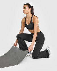 SoftMotionâ„¢ Sports Bra with White Logo | Soft Black