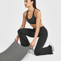 SoftMotionâ„¢ Sports Bra with White Logo | Soft Black