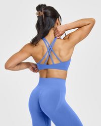 EasyLiftâ„¢ High Neck Sports Bra with White Logo | Glaucous Blue
