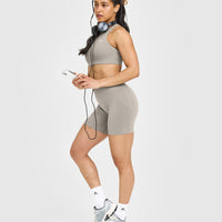 EasyLiftâ„¢ High Neck Sports Bra with White Logo | Warm Sand