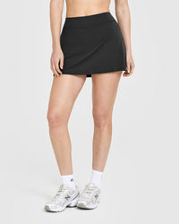 SoftMotion™ Skort with White Logo | Soft Black