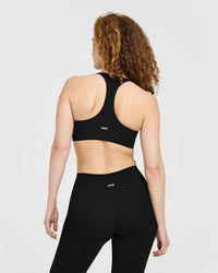 SoftMotion™ Sports Bra with White Logo | Black