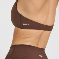 SoftMotion™ Minimal Halter Neck Bralette with White Logo | Espresso Brown