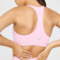 SoftMotion™ Sports Bra with White Logo | Chalk Pink